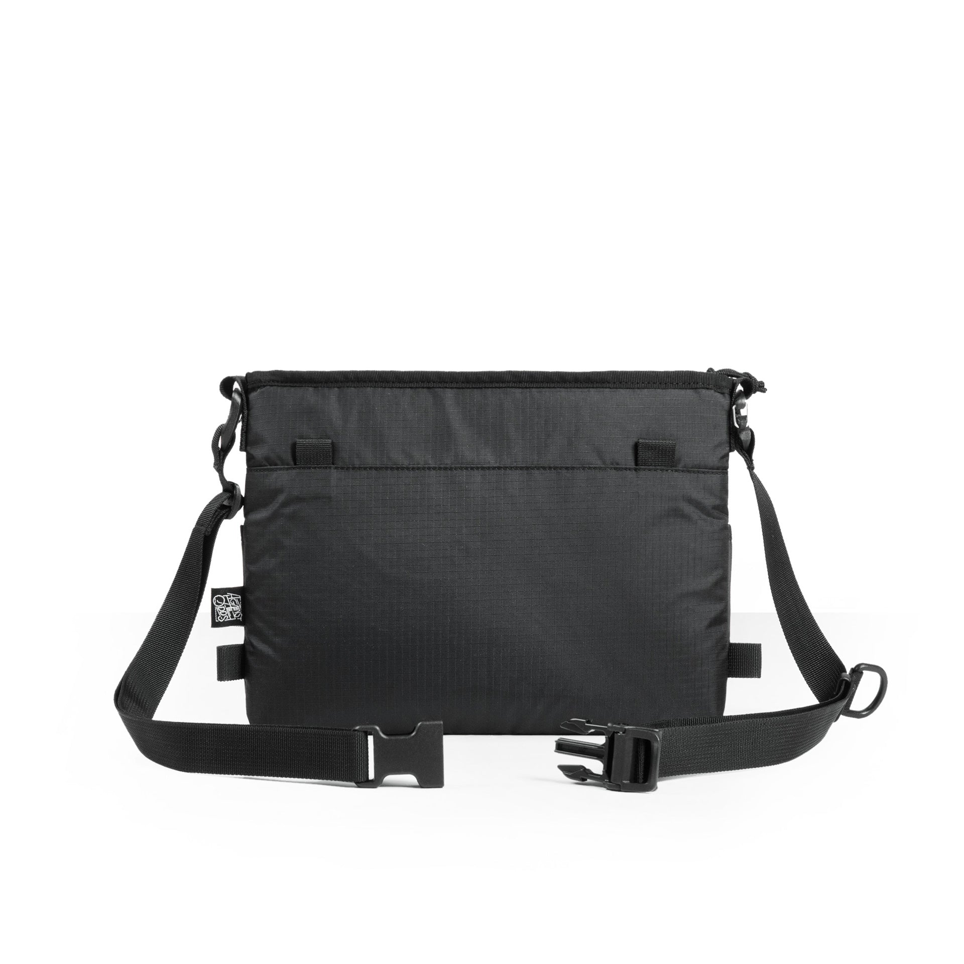 The Sacoche shoulder bag in black ripstop with adjustable strap, front view.